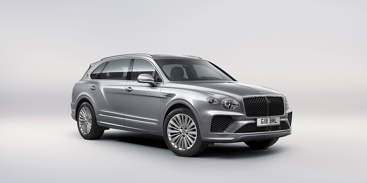 Bentley Leusden Bentley Bentayga Extended Wheelbase luxury SUV front three quarter view in Moonbeam paint with 21 inch five spoke painted wheels