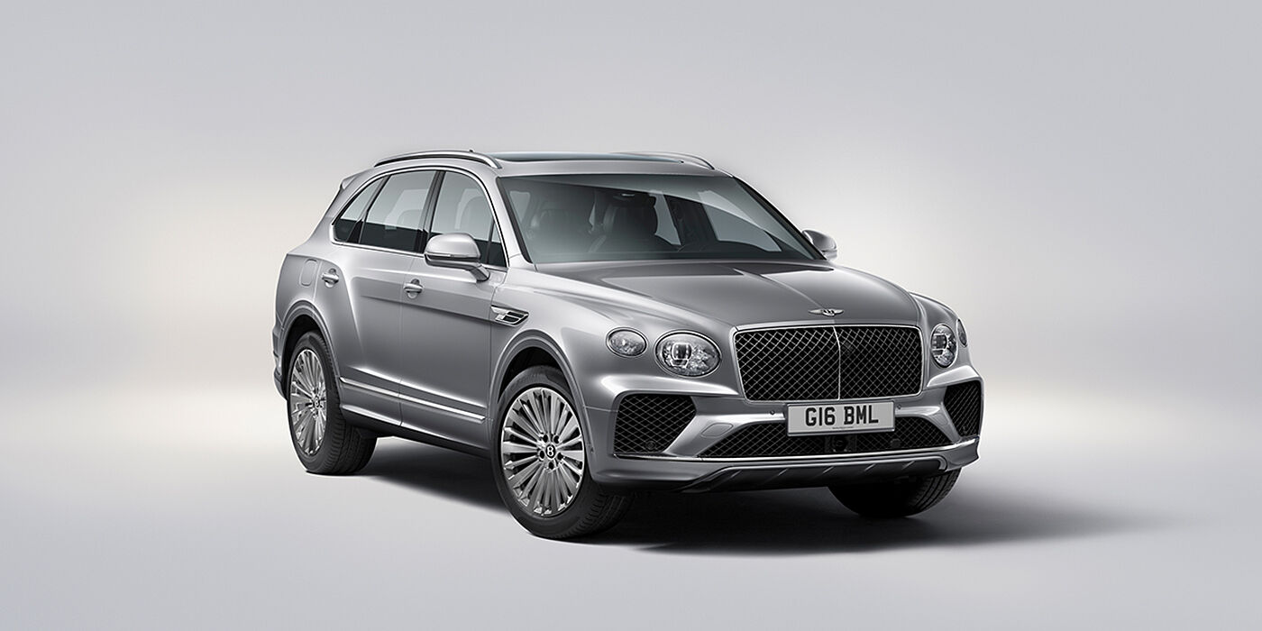 Bentley Leusden Bentley Bentayga luxury SUV front three quarter view in Moonbeam paint with matrix grille and 21″ 5 spoke painted wheels