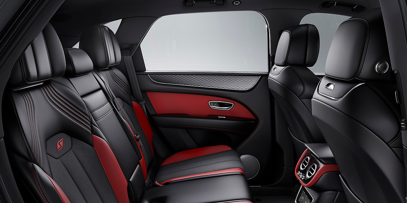 Bentley Leusden Bentey Bentayga S interior view for rear passengers with Beluga black and Hotspur red coloured hide.