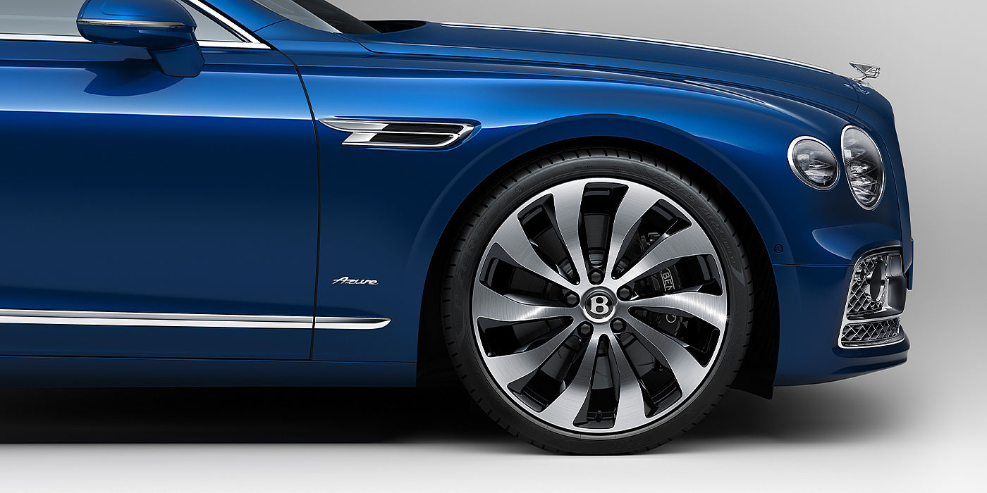 Bentley Leusden Bentley Flying Spur Azure sedan side close up in Sequin Blue paint with Azure badge