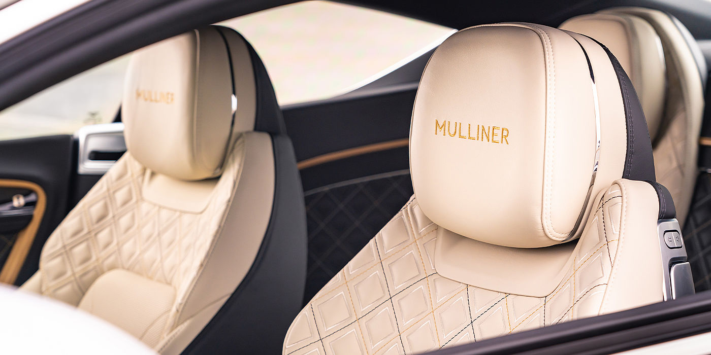 Bentley Leusden Bentley Continental GT Mulliner coupe seat detail in Beluga black and Linen hide