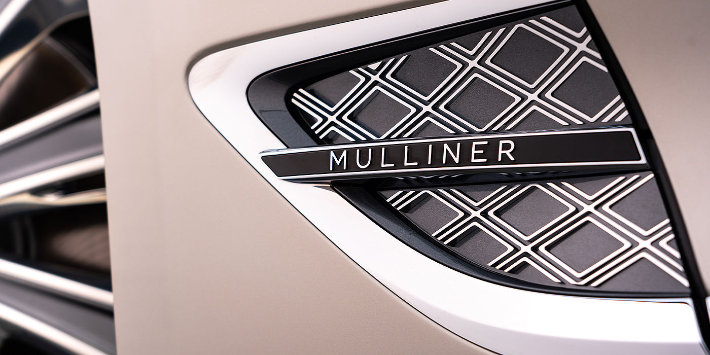 Bentley Leusden Bentley Continental GT Mulliner coupe in White Sand paint Mulliner wing vent close up