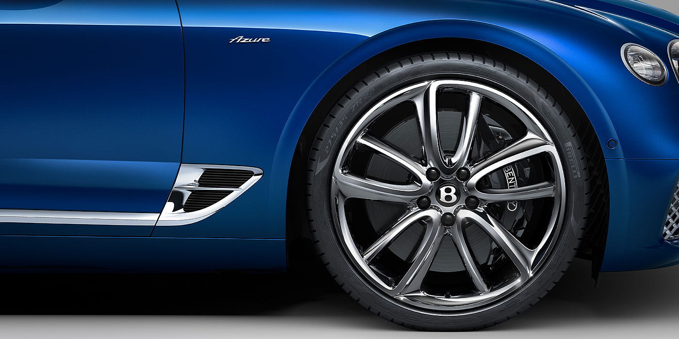 Bentley Leusden Bentley Continental GTC Azure convertible in Sequin Blue paint side profile with Azure badge close up
