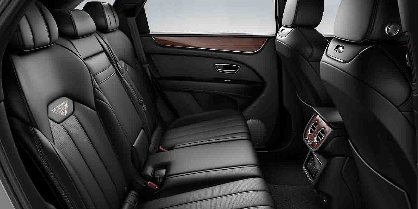 Bentley Leusden Bentley Bentayga EWB interior view for rear passengers with Beluga black hide.