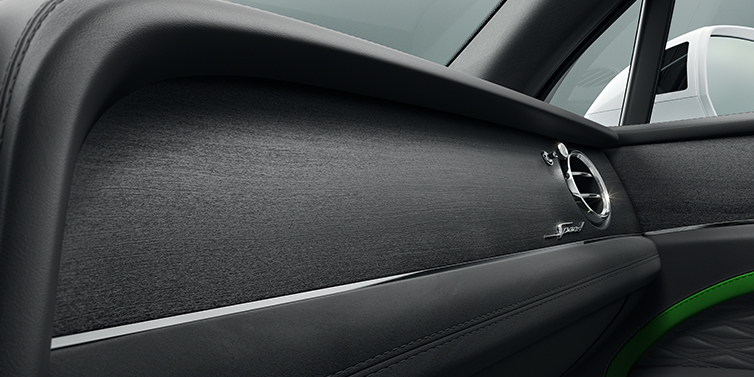 Bentley Leusden Bentley Bentayga Speed SUV front dash close up in Hyper Green and Beluga black hides, with Black Stained Crown Cut Walnut veneer